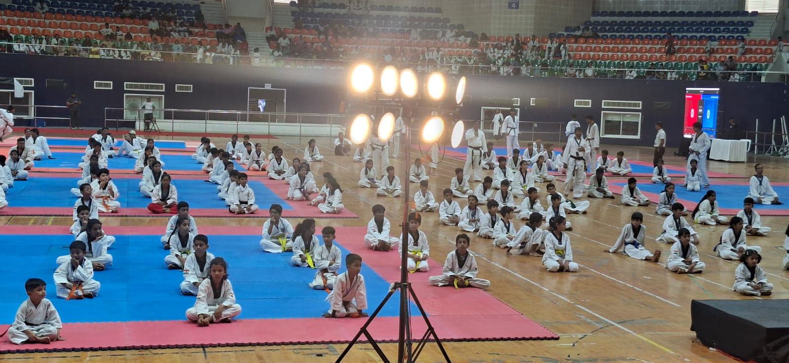 Athletes and teams on the championship floor